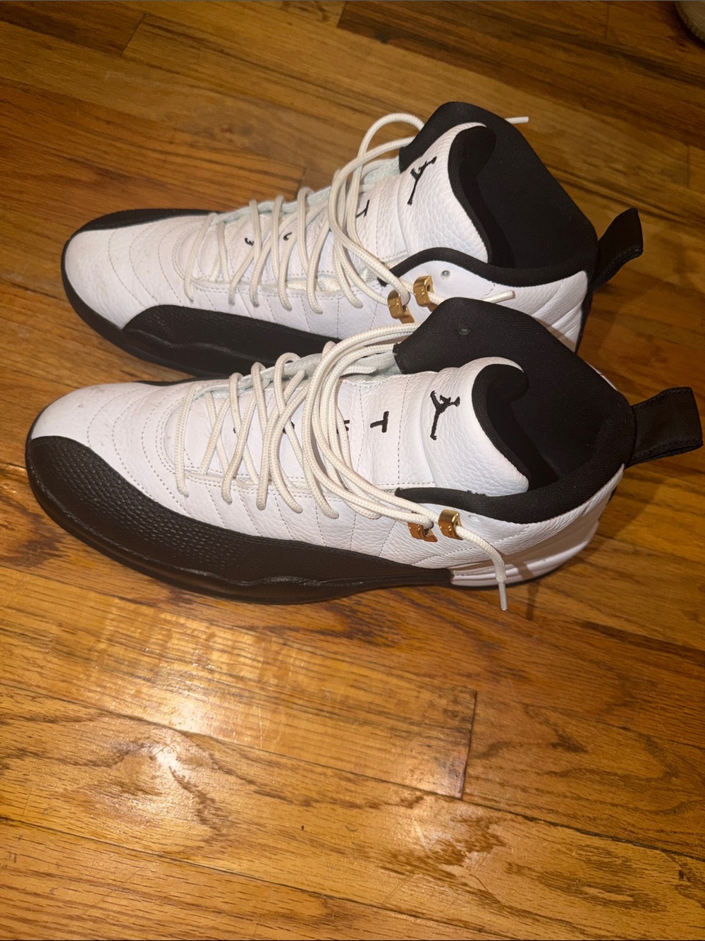 Jordan Retro 12 High-Top Sneakers in White, Black and Gold